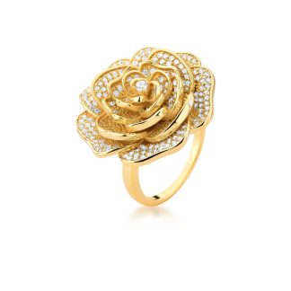 Anillo grande con circonita y flor frontal curvada en oro